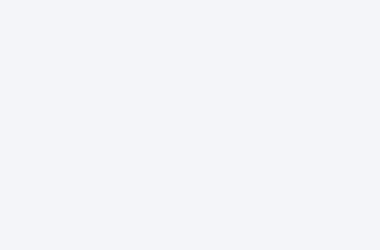 A plain, light grey background with no visible objects, text, or patterns.